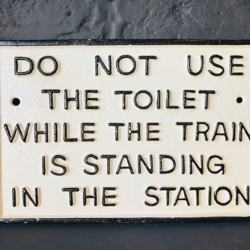 quirky toilet sign